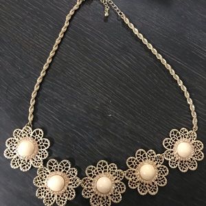 Flower gold statement necklace.
